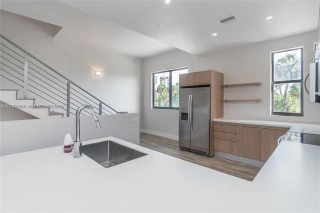 a view of kitchen with wooden floor