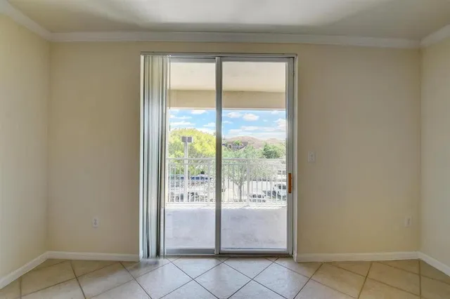 a view of an empty room and window