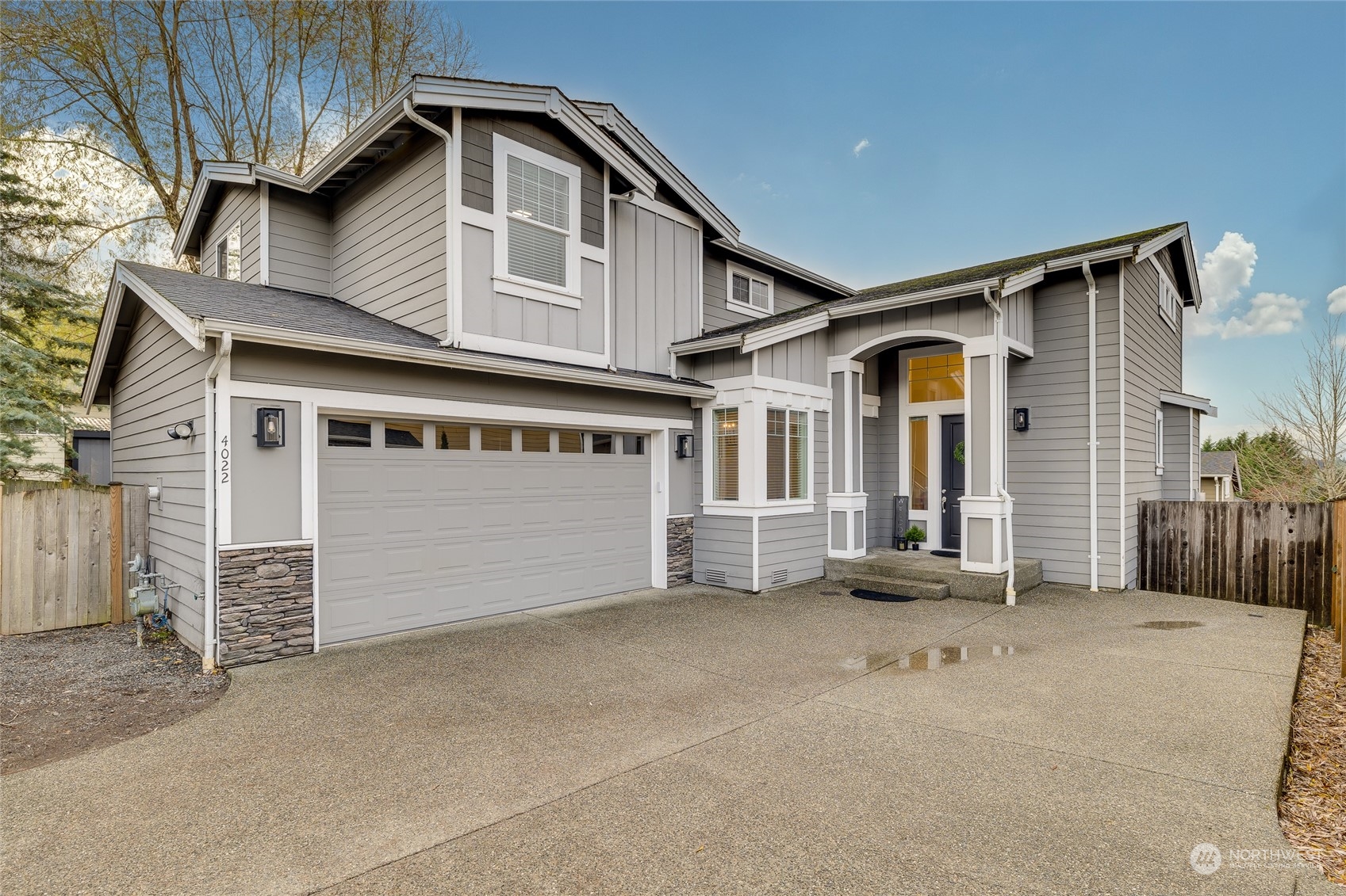 4022 222nd Place Southeast Bothell, WA 98021 - Photo 1 of 40 a view of a house with a garage