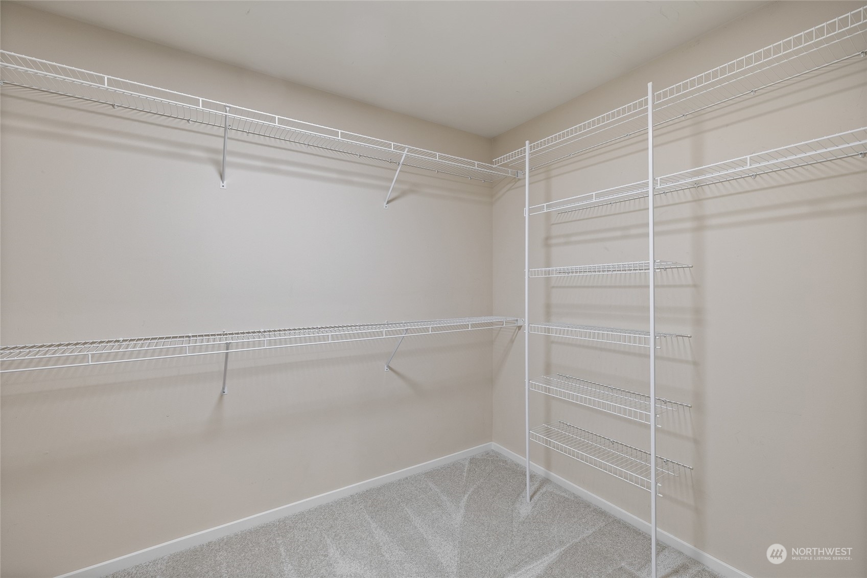 4022 222nd Place Southeast Bothell, WA 98021 - Photo 18 of 40 a view of a room with racks on the wall