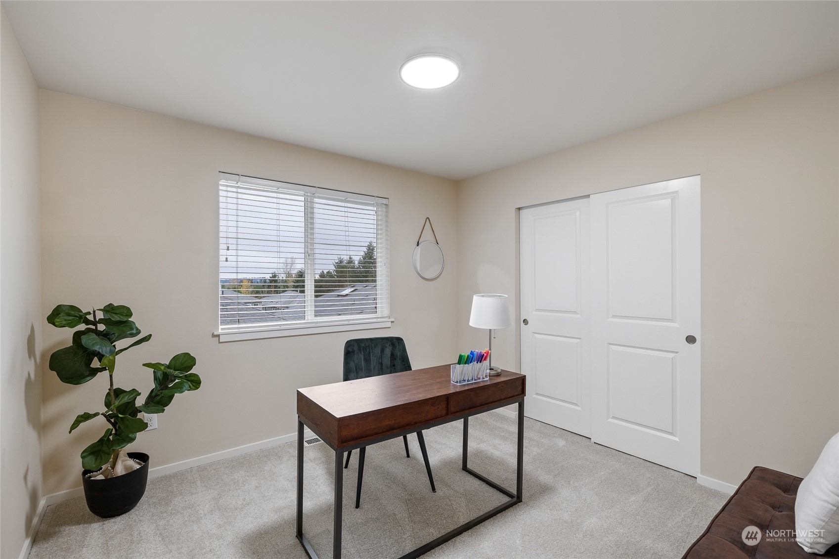 4022 222nd Place Southeast Bothell, WA 98021 - Photo 19 of 40 a workspace with furniture and a window