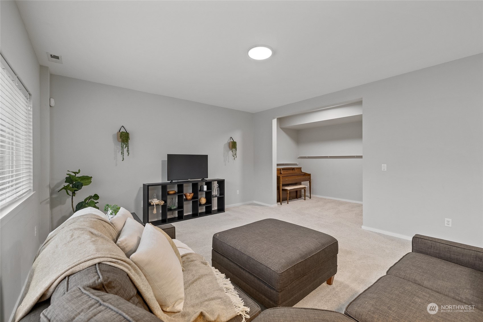 4022 222nd Place Southeast Bothell, WA 98021 - Photo 26 of 40 a living room with furniture and a couch