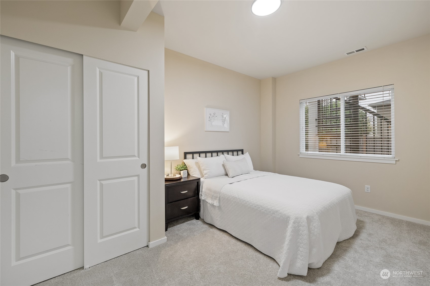 4022 222nd Place Southeast Bothell, WA 98021 - Photo 27 of 40 a bedroom with a bed and a window