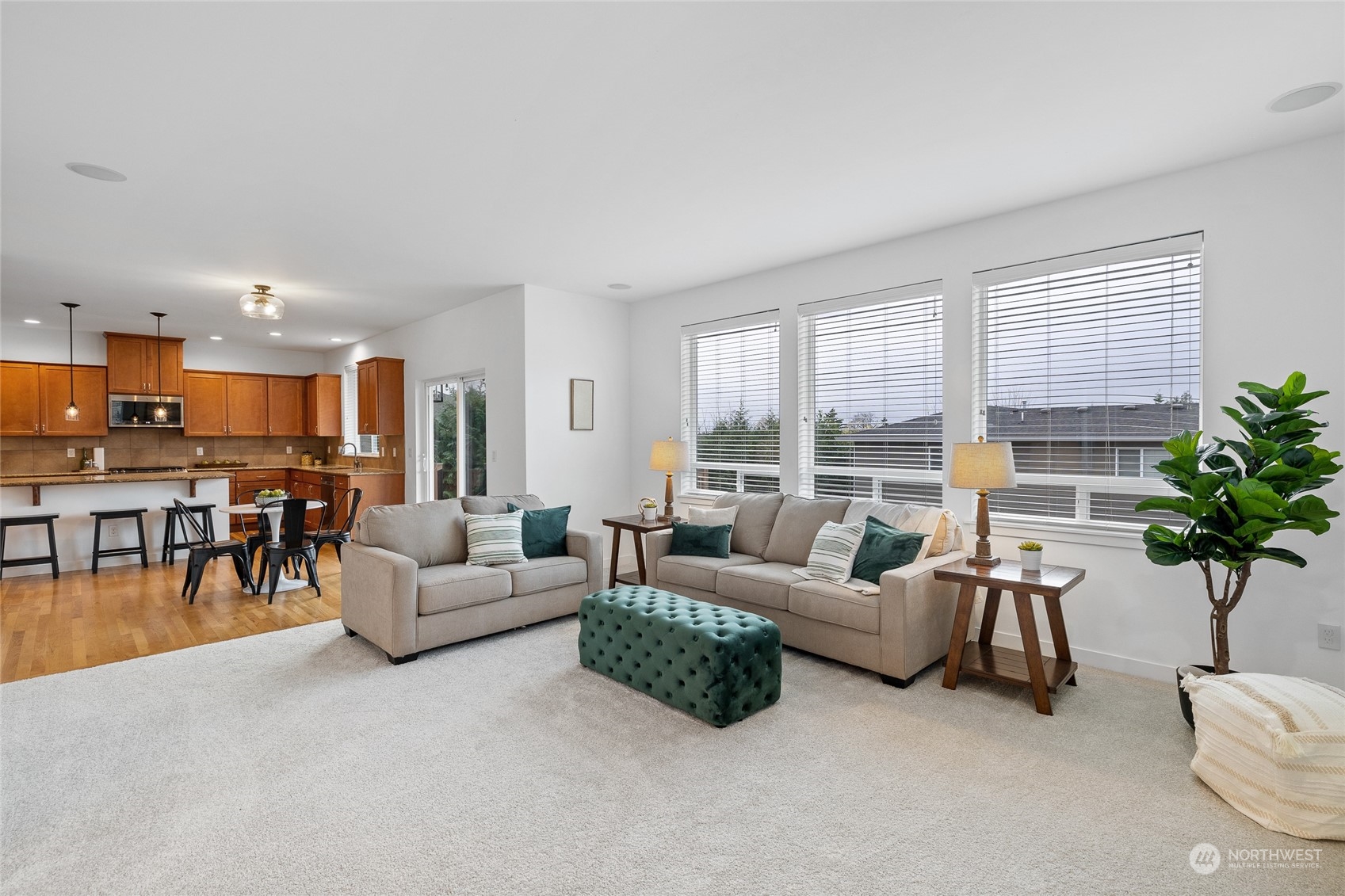 4022 222nd Place Southeast Bothell, WA 98021 - Photo 4 of 40 a living room with furniture and a large window