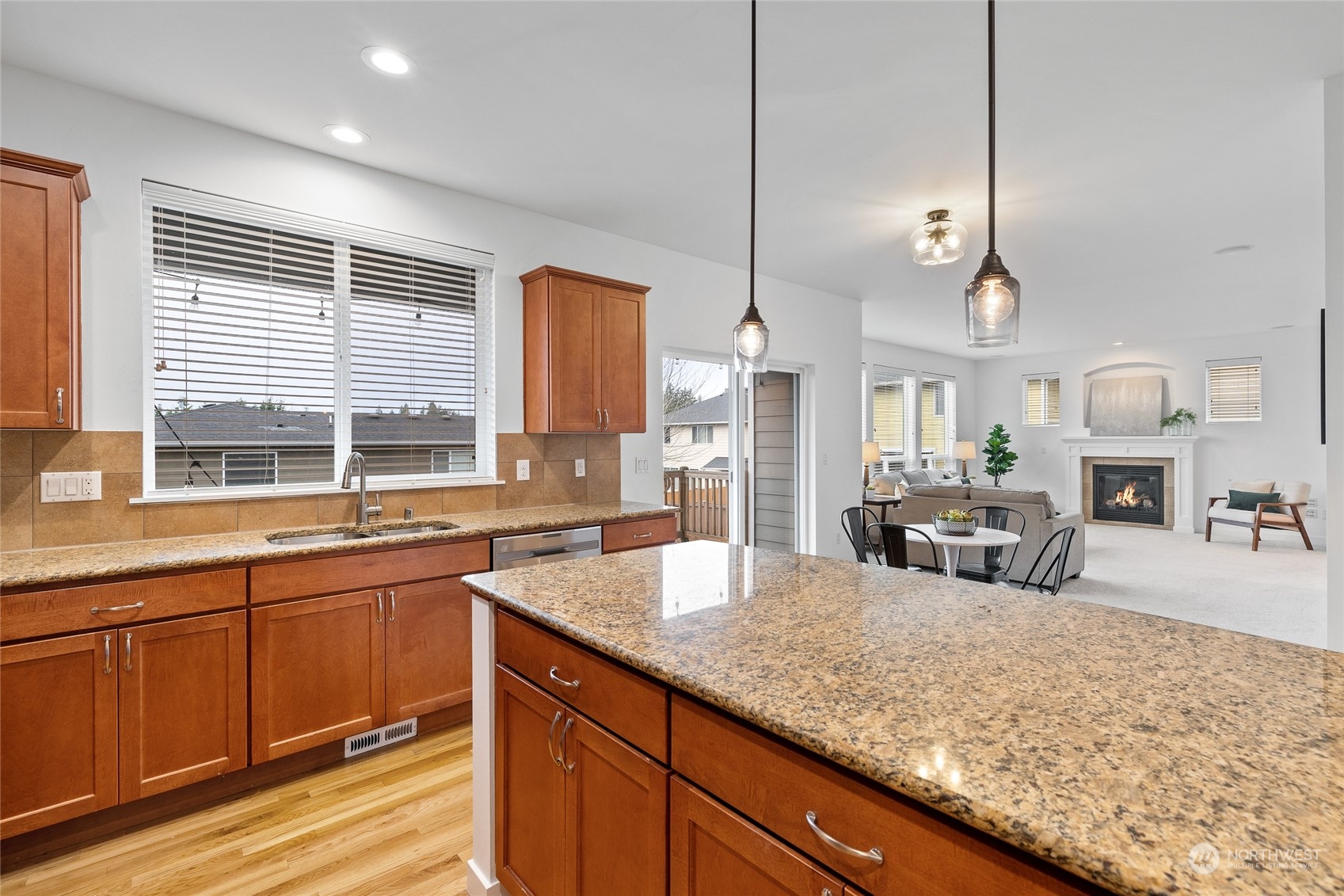 4022 222nd Place Southeast Bothell, WA 98021 - Photo 10 of 40 a kitchen with sink stove and cabinets