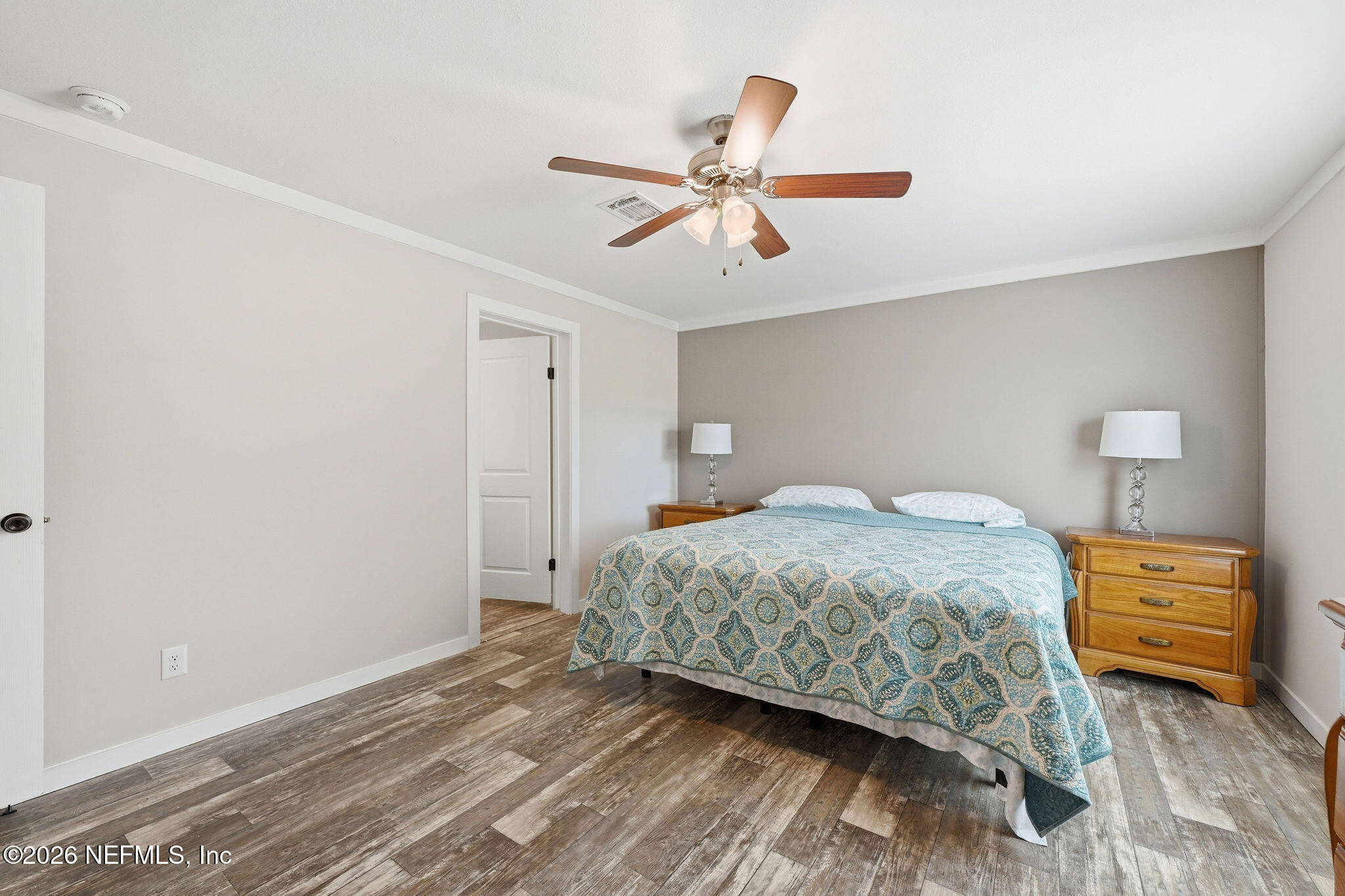 101 Oakhaven Road Pomona Park, FL 32181 - Photo 14 of 23 a bedroom with a bed and a ceiling fan