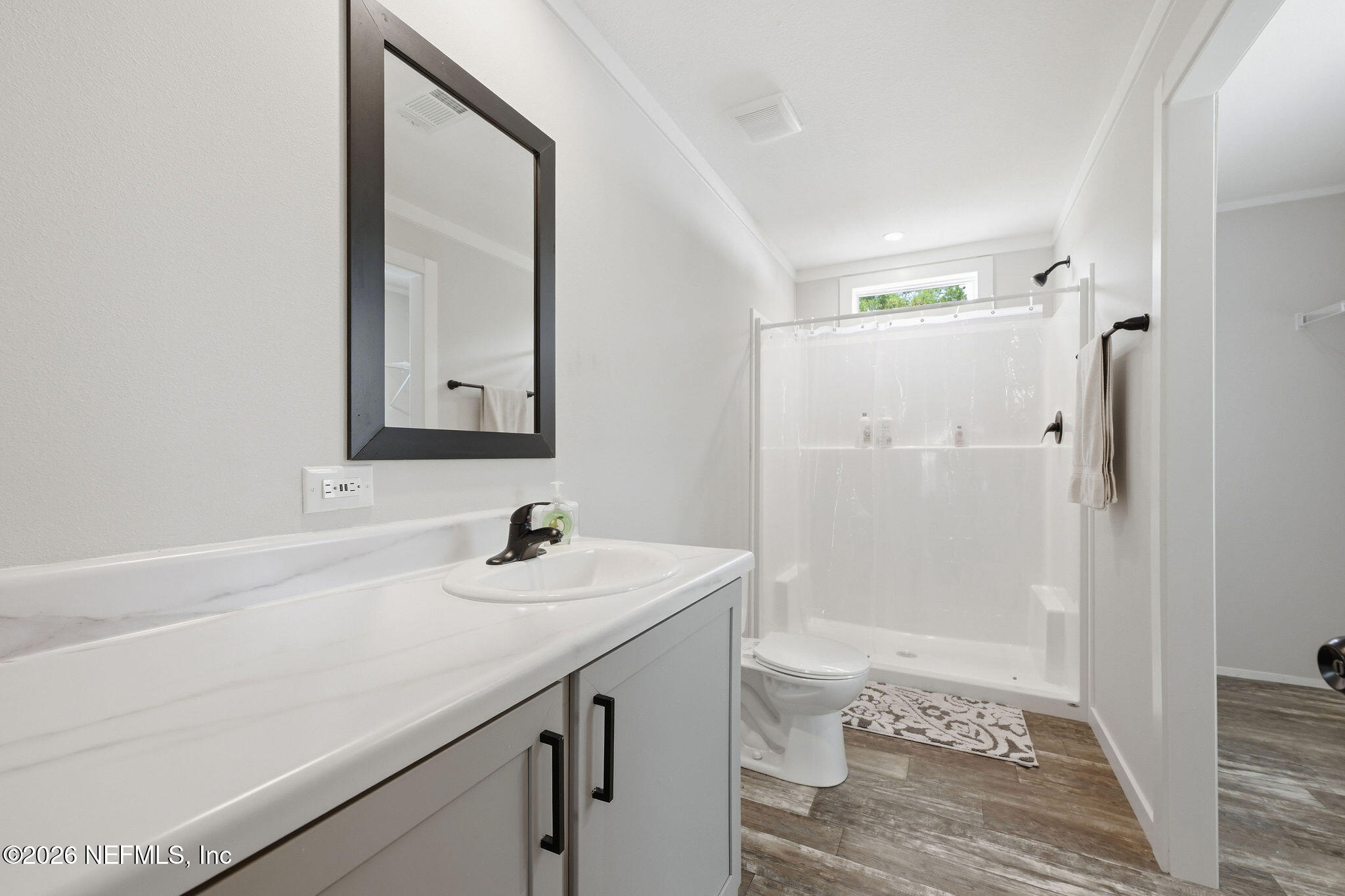 101 Oakhaven Road Pomona Park, FL 32181 - Photo 15 of 23 a bathroom with a sink a toilet and shower