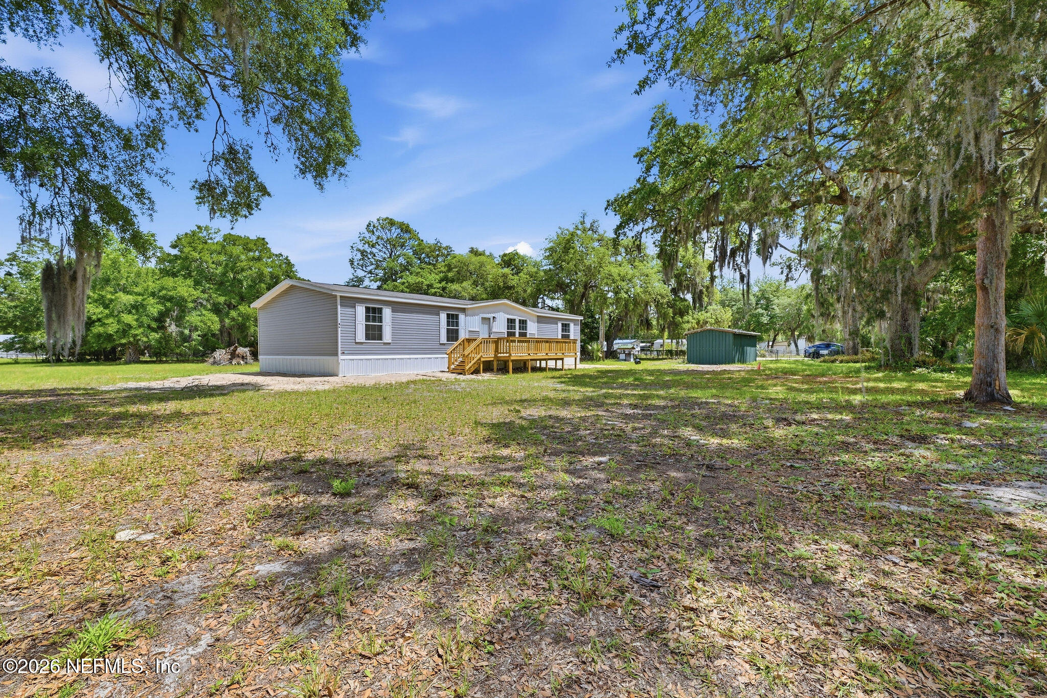 101 Oakhaven Road Pomona Park, FL 32181 - Photo 20 of 23 a house view with a garden space