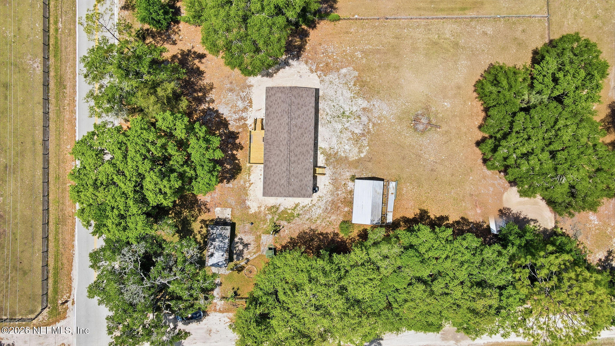 101 Oakhaven Road Pomona Park, FL 32181 - Photo 22 of 23 an aerial view of a multi story residential apartment building with a yard