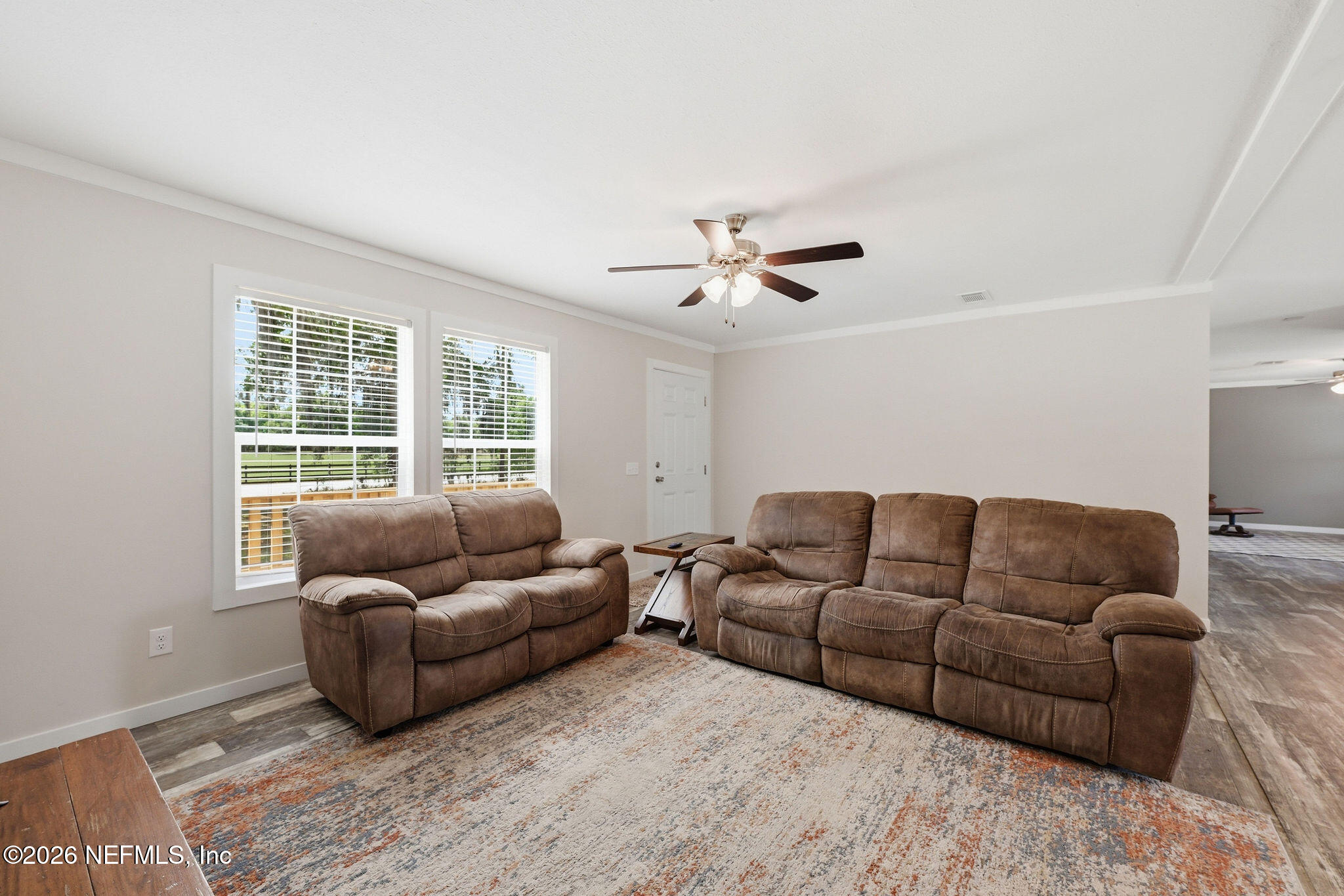 101 Oakhaven Road Pomona Park, FL 32181 - Photo 6 of 23 a living room with furniture and a large window
