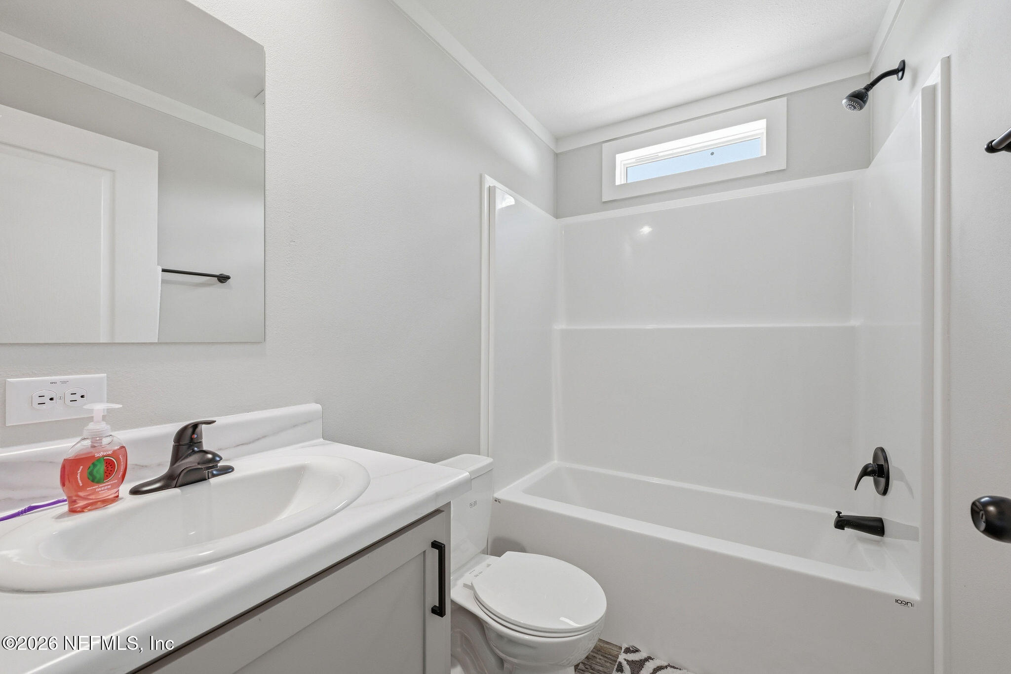 101 Oakhaven Road Pomona Park, FL 32181 - Photo 7 of 23 a bathroom with a sink toilet and shower