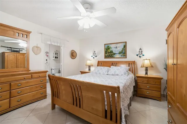 a view of a hallway with paintings on the wall