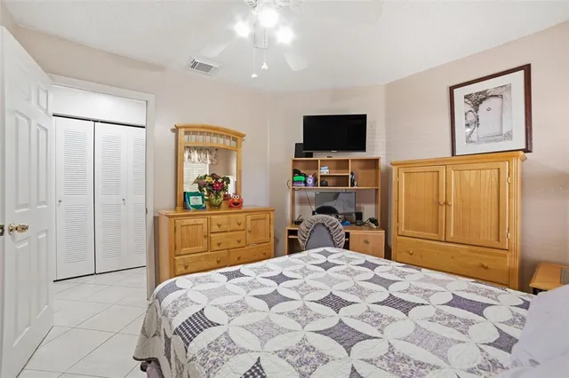 a bathroom with a sink mirror and a shower