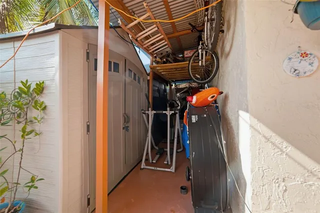 a front view of a house with a yard and tree s