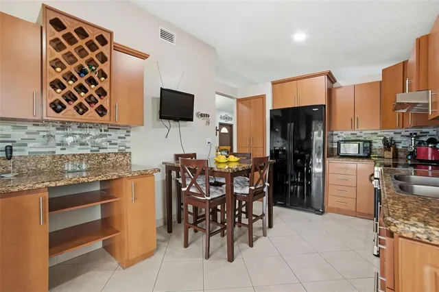 a bedroom with a bed and a table