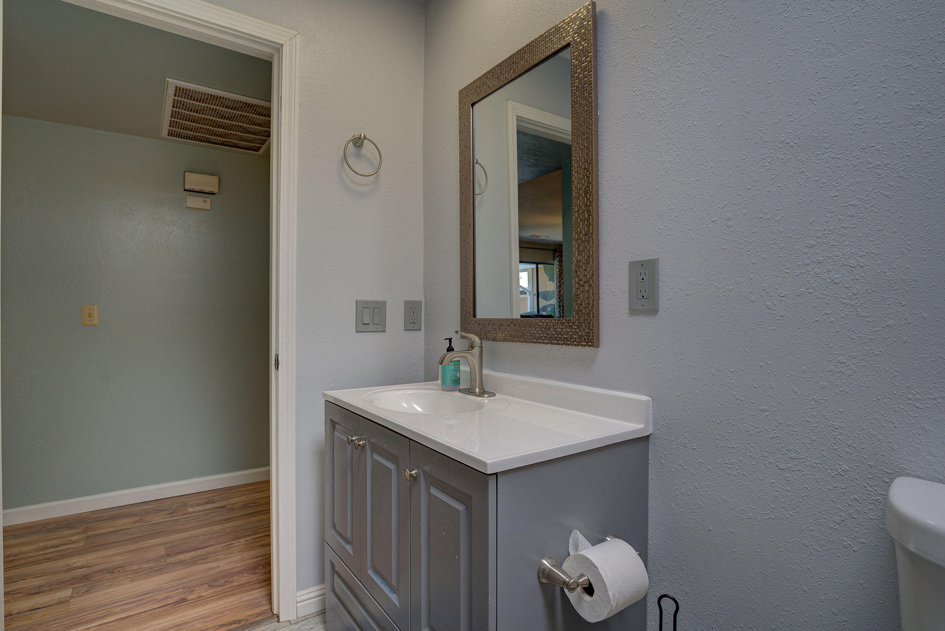 12814 Williamson Road Redding, CA 96003 - Photo 12 of 39 a bathroom with a sink and a mirror
