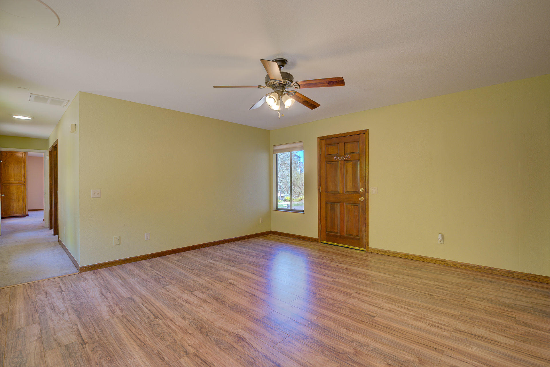 12814 Williamson Road Redding, CA 96003 - Photo 27 of 39 a view of empty room with wooden floor