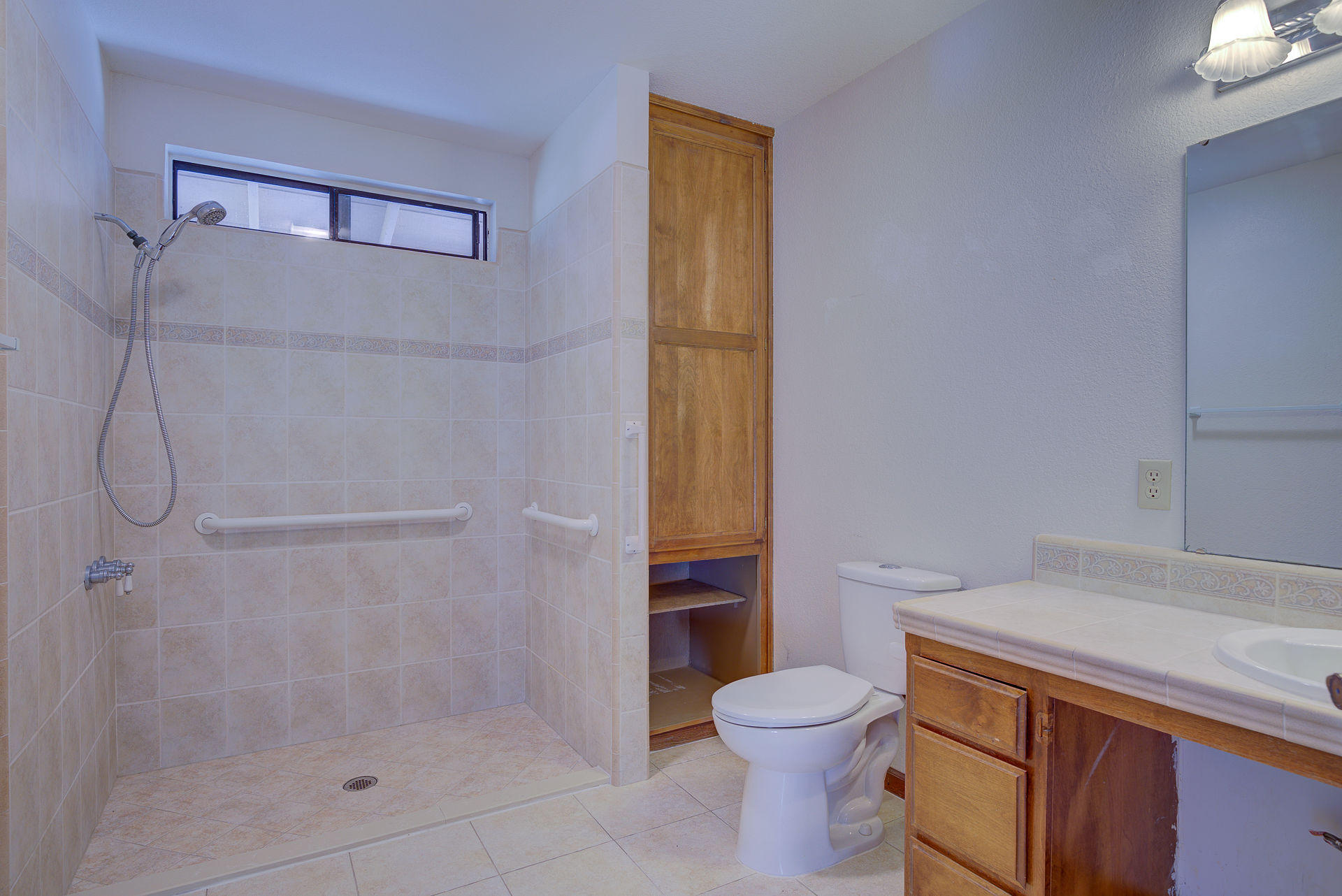 12814 Williamson Road Redding, CA 96003 - Photo 32 of 39 a bathroom with a granite countertop sink toilet and shower