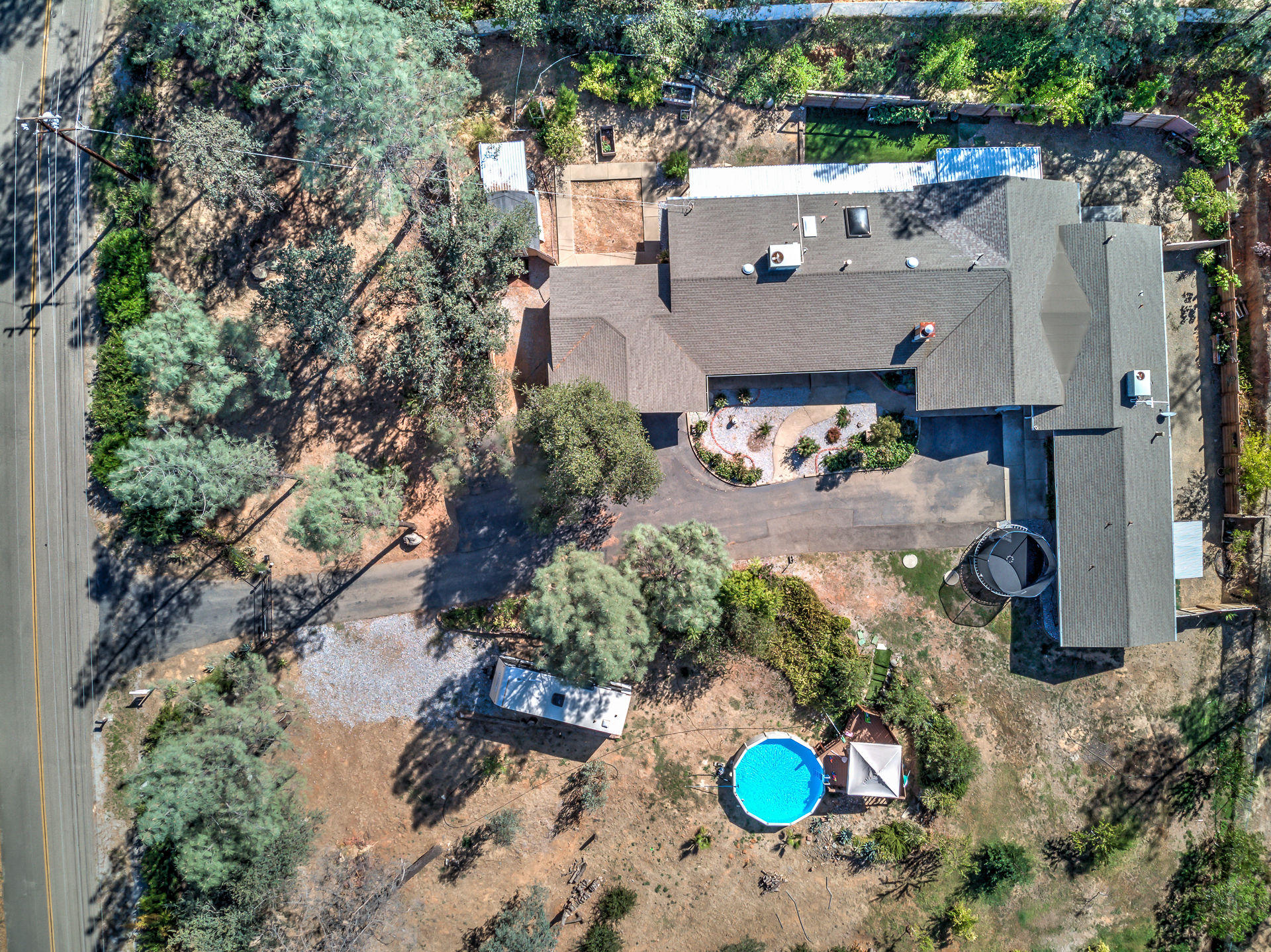 12814 Williamson Road Redding, CA 96003 - Photo 36 of 39 an aerial view of a house with a swimming pool