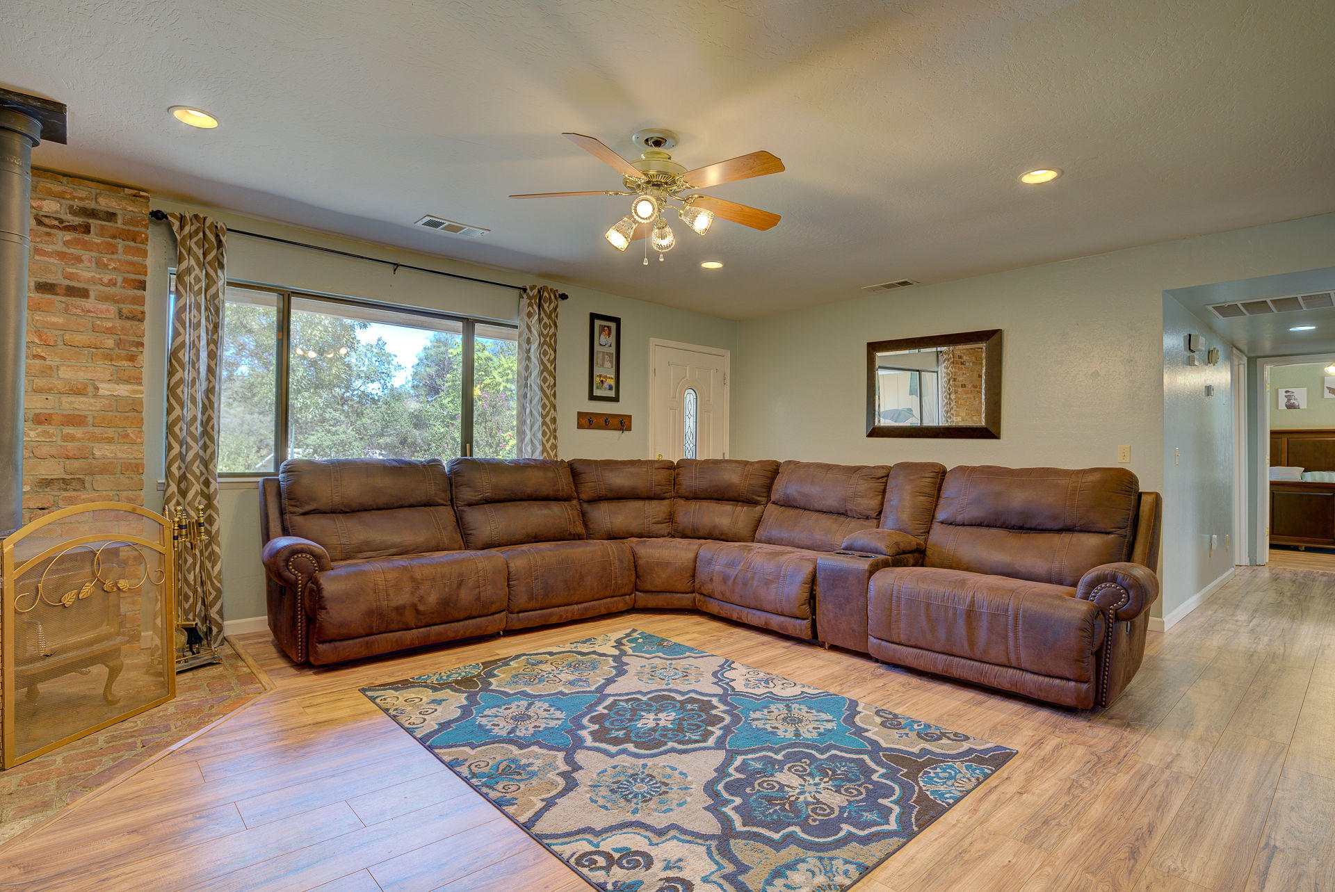 12814 Williamson Road Redding, CA 96003 - Photo 4 of 39 a living room with furniture and a large window