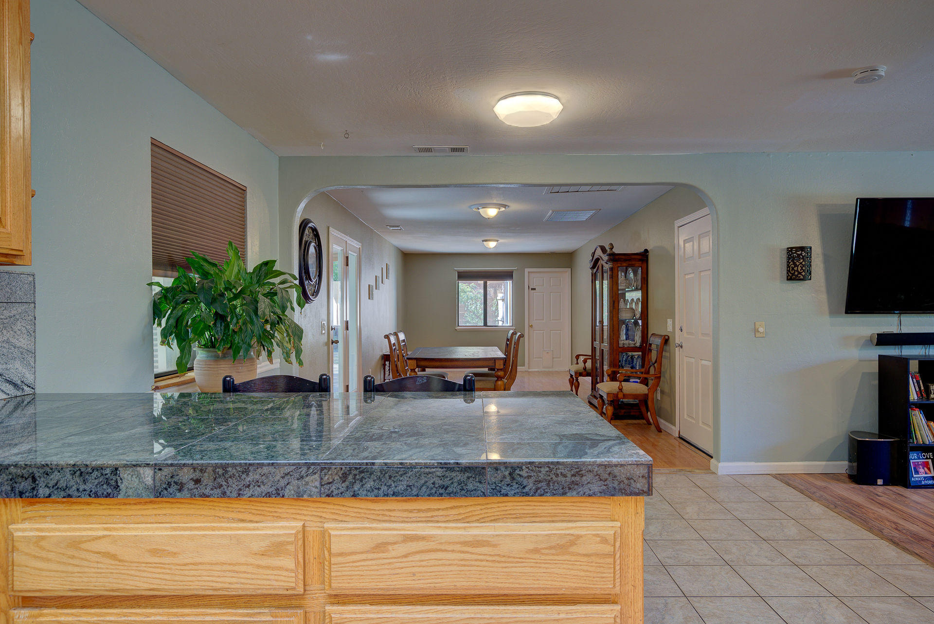 12814 Williamson Road Redding, CA 96003 - Photo 9 of 39 a kitchen with sink and view living room