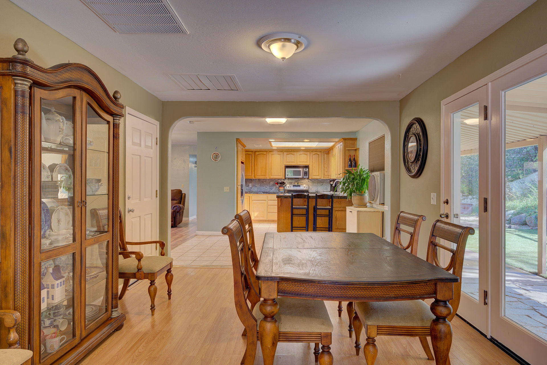 12814 Williamson Road Redding, CA 96003 - Photo 10 of 39 a view of a dining room with furniture and wooden floor