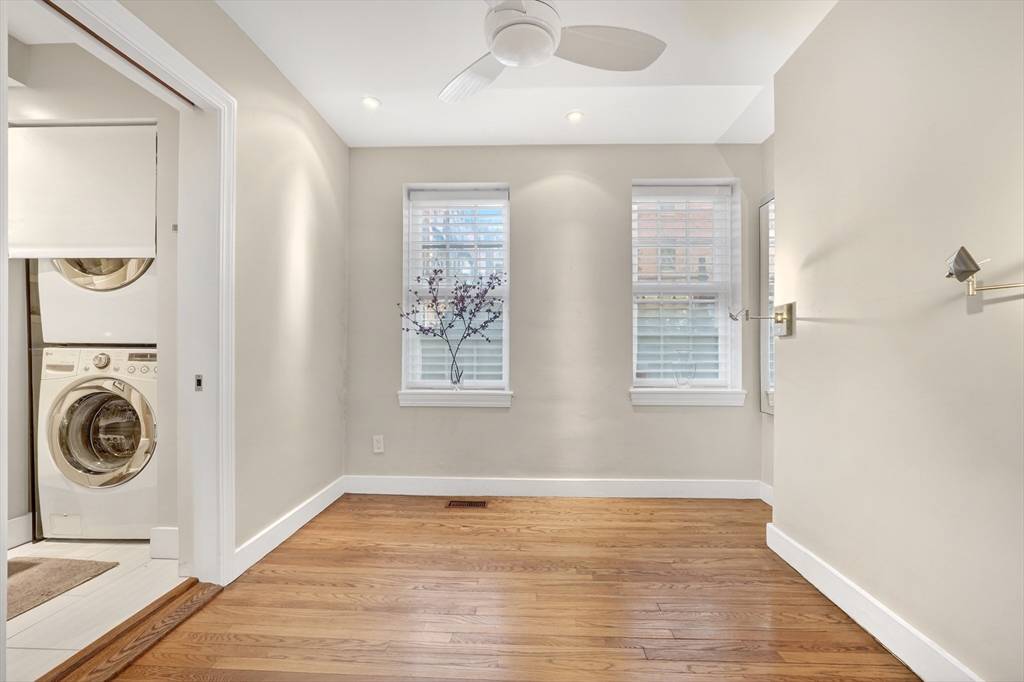 42 Clarendon Street, Unit 1 Boston, MA 02116 - Photo 17 of 26 a view of a livingroom with washer and dryer
