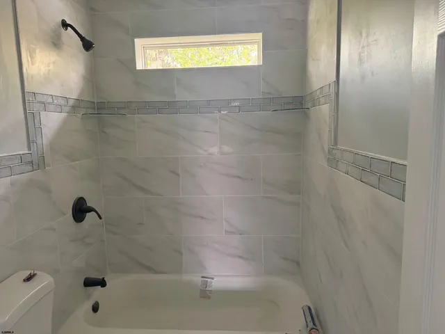 a bathroom with a bathtub
