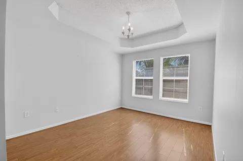 a room with pool table table and a rug