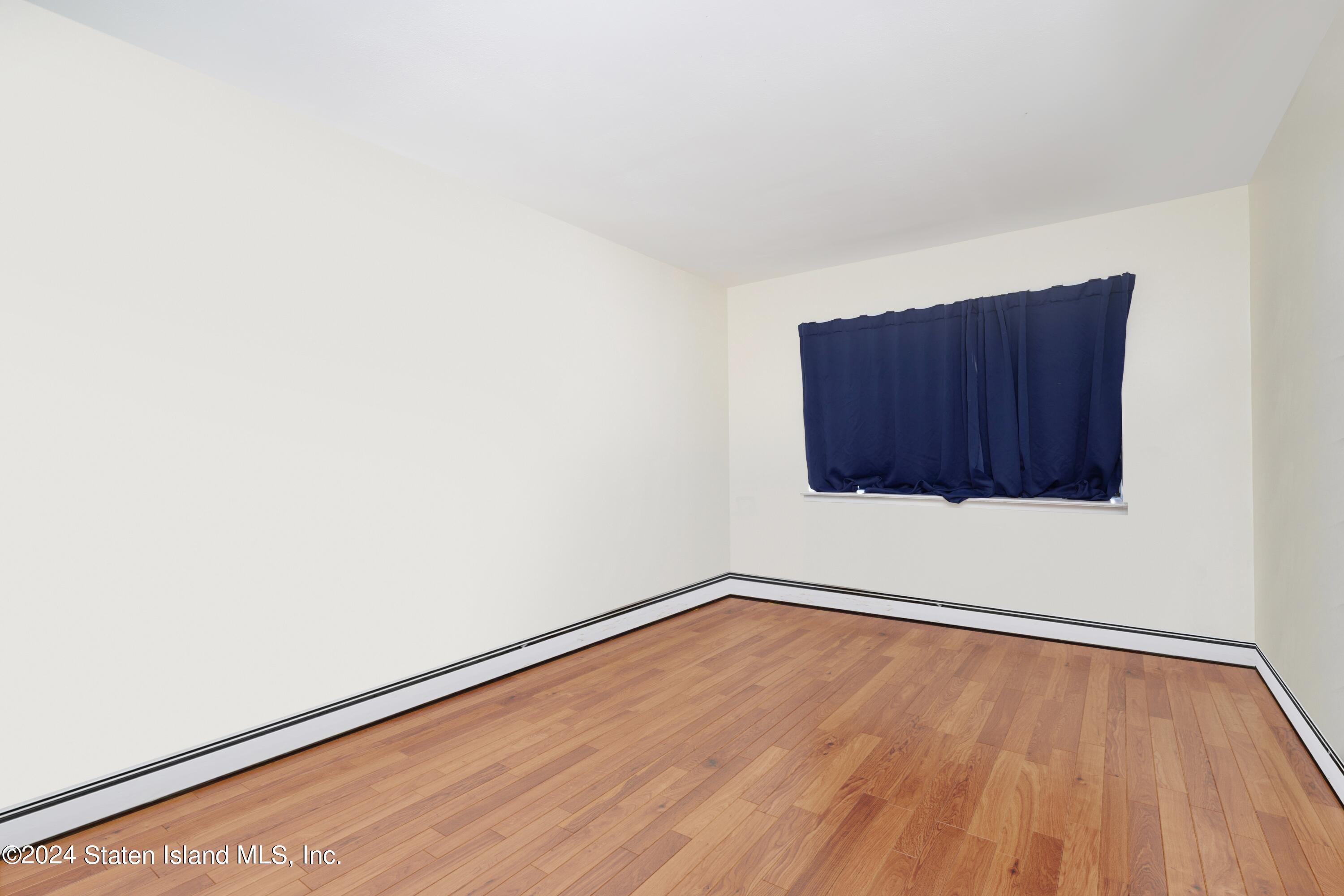 51 Racal Court Staten Island, NY 10314 - Photo 36 of 42 35 1ST FL BEDROOM