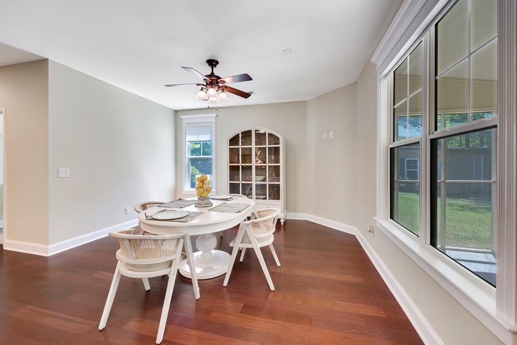 182 Oak Ridge Drive Waverly Hall, GA 31831 - Photo 24 of 67 a view of a dining room with furniture window and wooden floor
