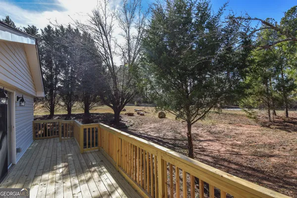 a view of a pathway with a yard