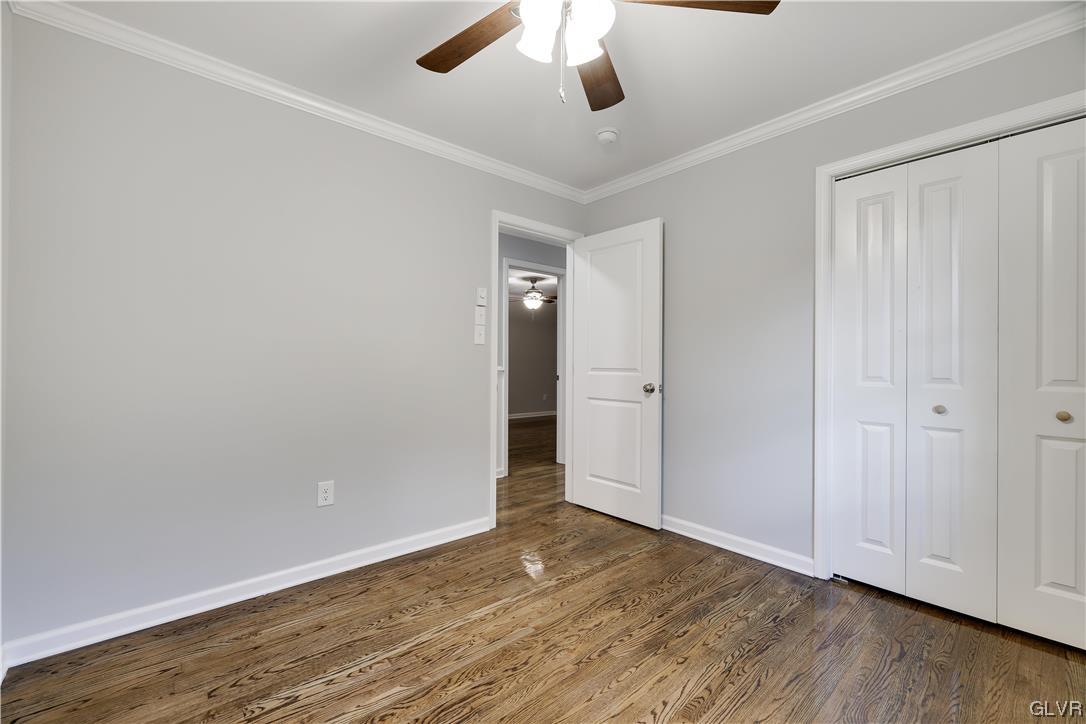 279 Clarks Road Cresco, PA 18326 - Photo 21 of 49 an empty room with wooden floor and ceiling fan
