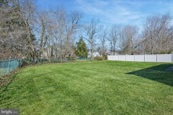 a view of garden with trees