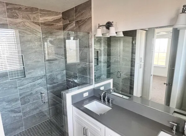 a bathroom with a toilet and a sink
