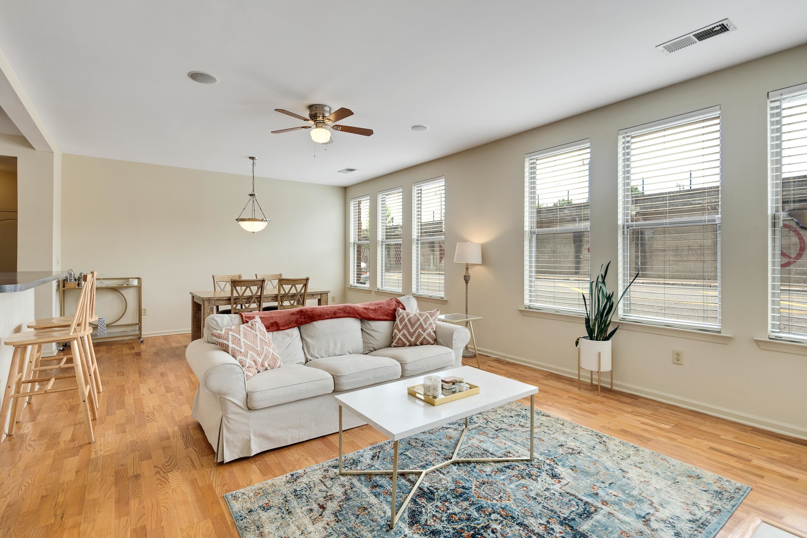 600 South Main Street, Unit 101 Memphis, TN 38103 - Photo 14 of 35 a living room with furniture and a large window