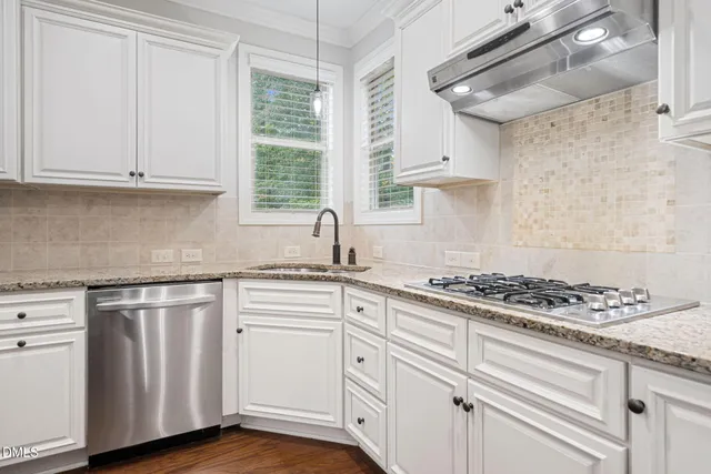 a bathroom with a toilet a sink and a mirror