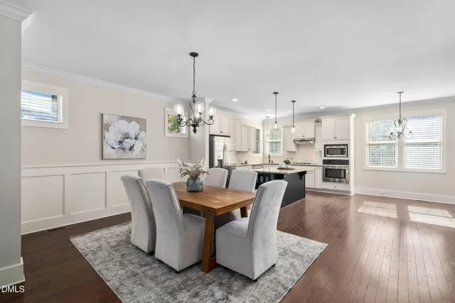 a bathroom with sink bathtub and mirror