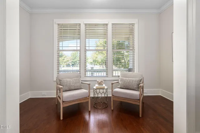 a bathroom with bathtub and window