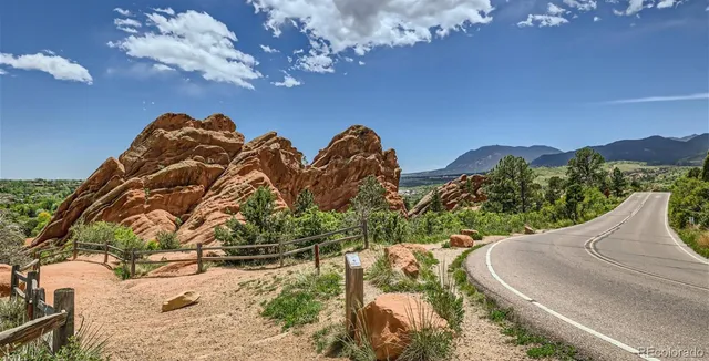 a view of a golf course with a lake
