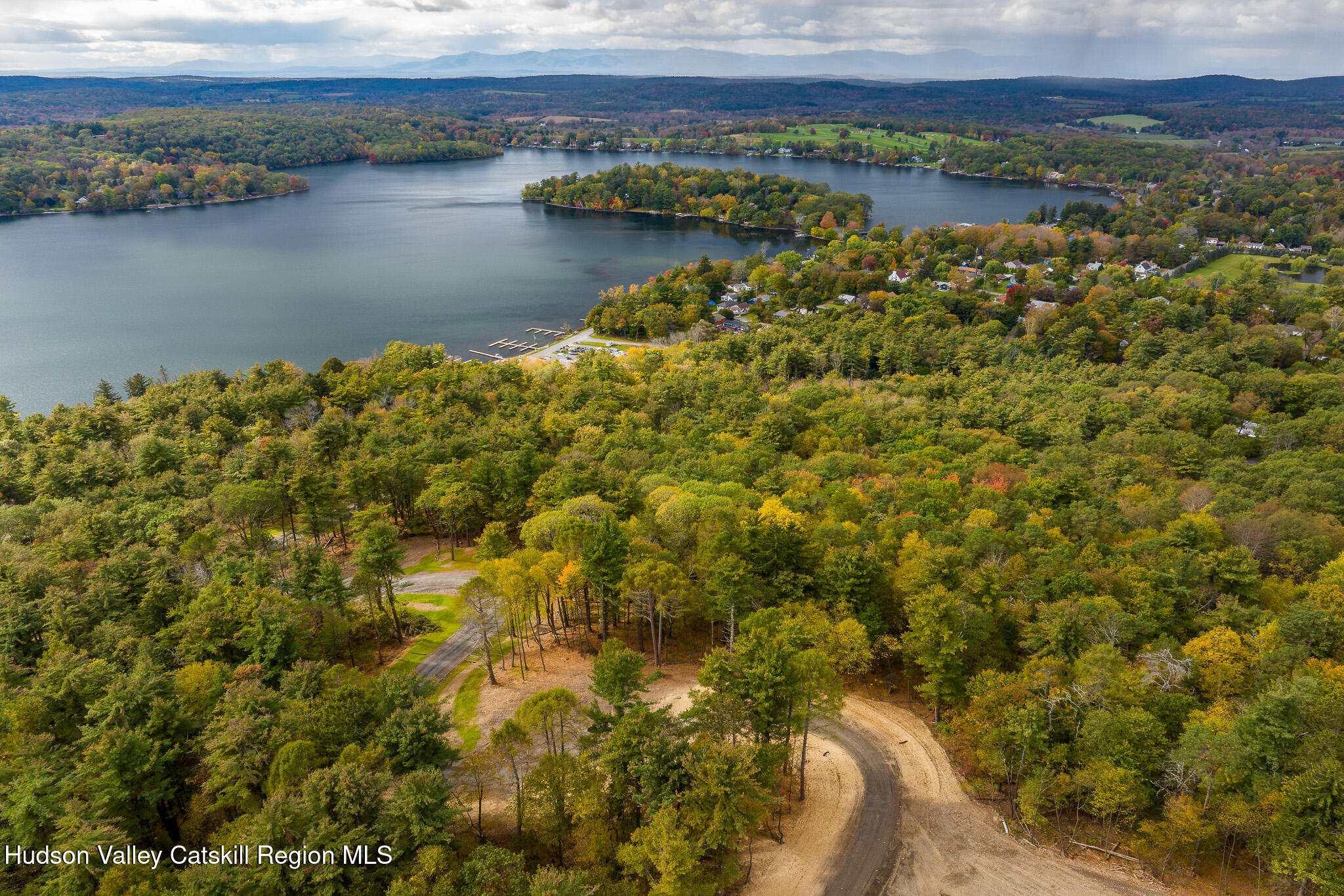 162 Lk Rdg Lane Copake Lake, NY 12521 - Photo 3 of 14 a view of a lake with a mountain in the background