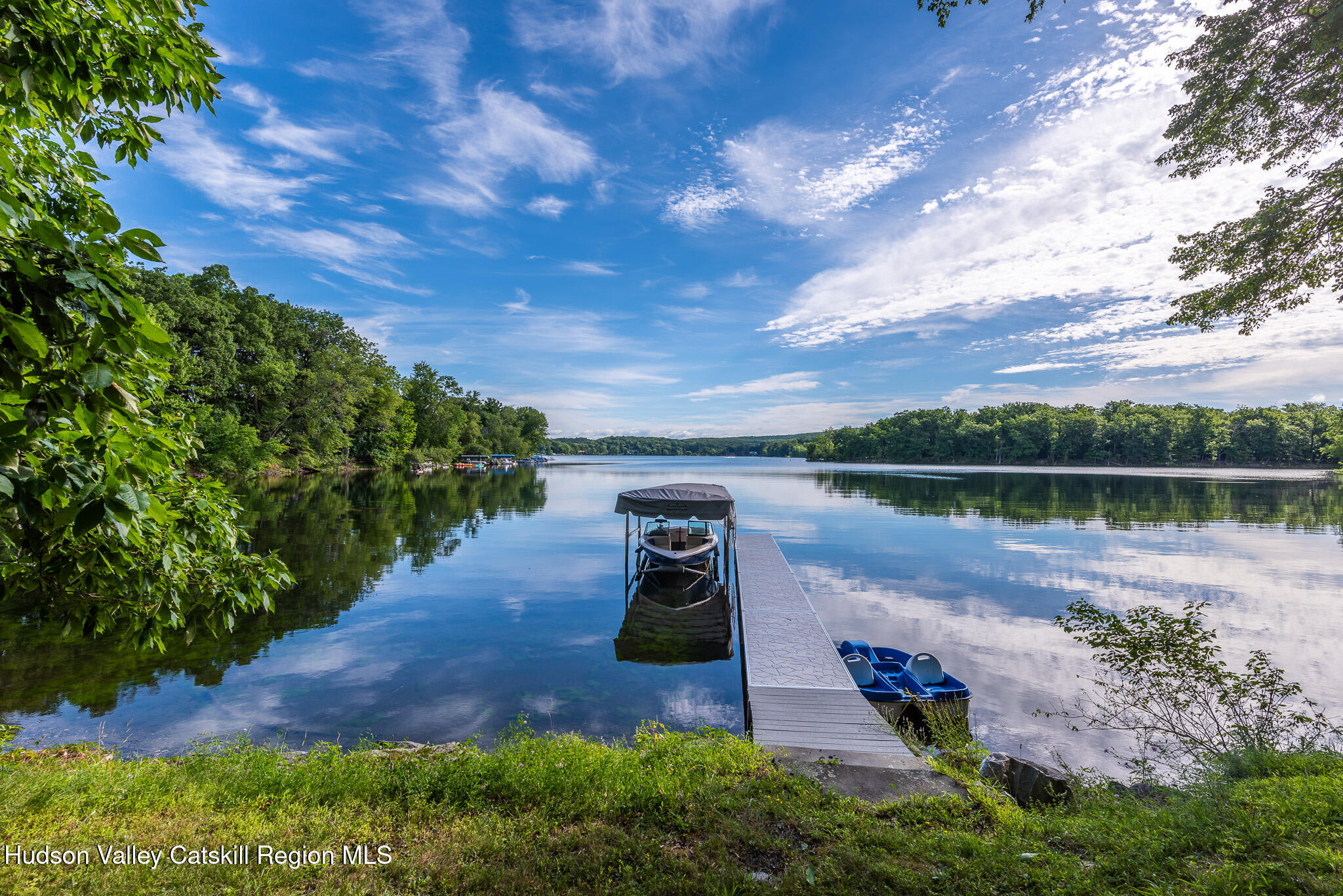 162 Lk Rdg Lane Copake Lake, NY 12521 - Photo 5 of 14 a view of a lake with a yard