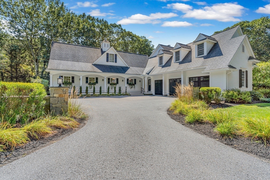 295 Musterfield Road Concord, MA 01742 - Photo 3 of 40 a front view of a house with a yard