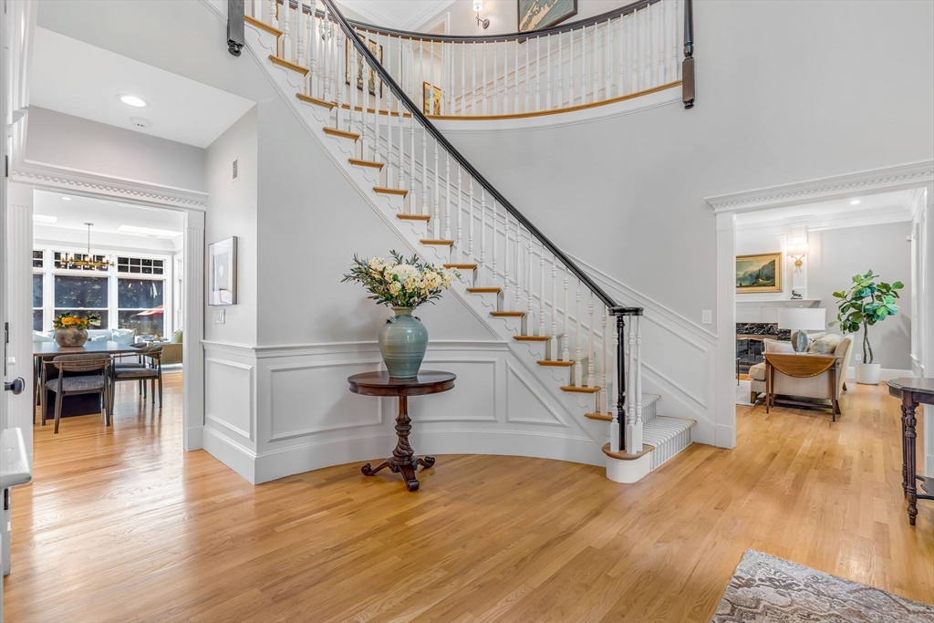 295 Musterfield Road Concord, MA 01742 - Photo 5 of 40 a view of entryway and hall with wooden floor