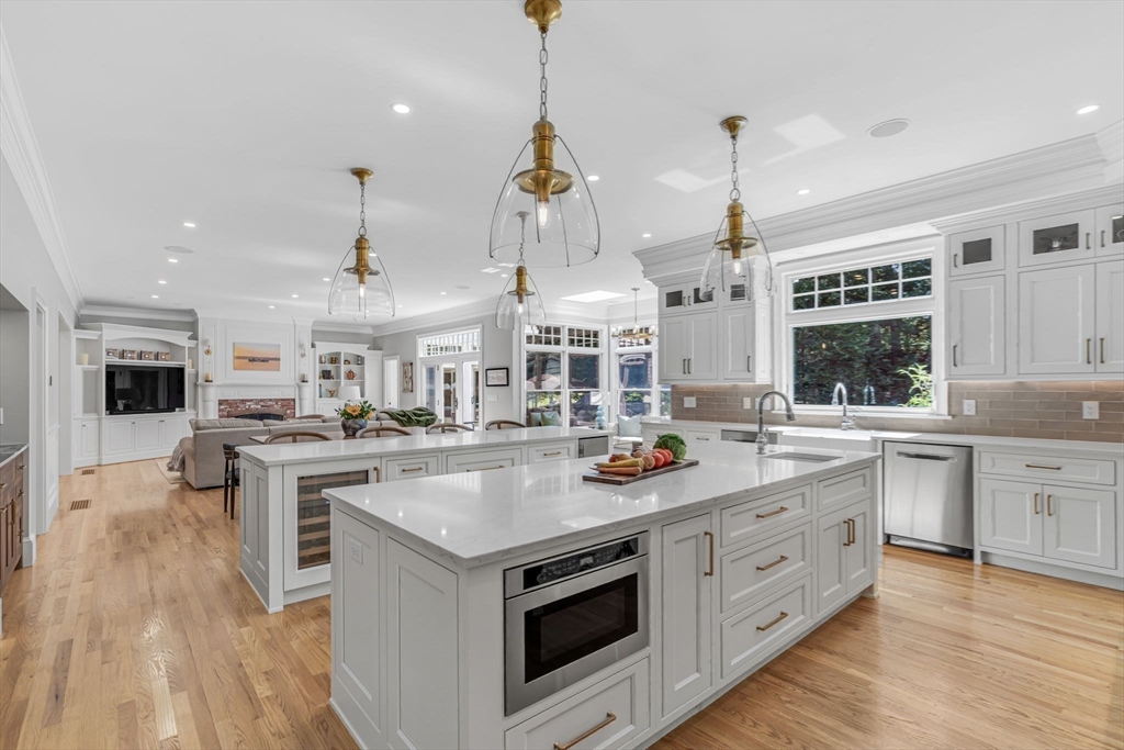 295 Musterfield Road Concord, MA 01742 - Photo 6 of 40 a kitchen with a stove and cabinets