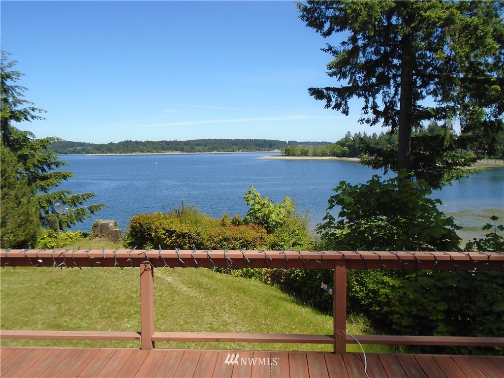 6219 Yeazell Road Southwest Longbranch, WA 98351 - Photo 1 of 27 a view of lake with mountain
