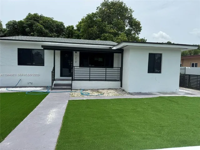 a front view of house with yard