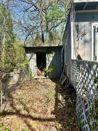a view of back yard from a patio