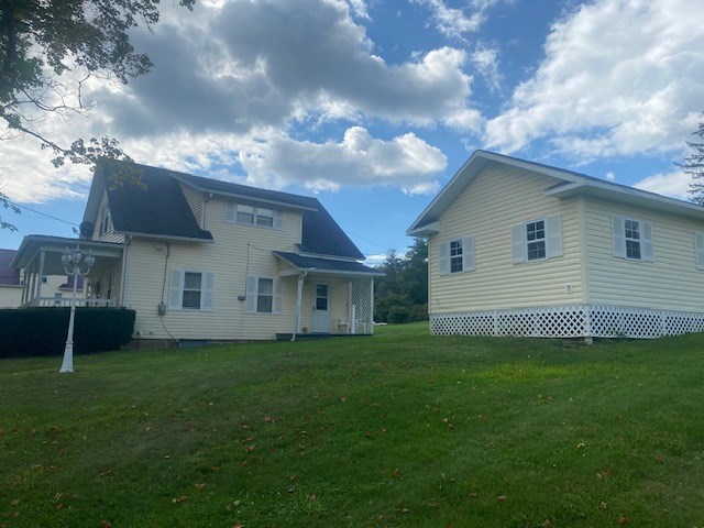 1007 Perryville Road Parker, PA 16049 - Photo 2 of 20 a house view with a garden space