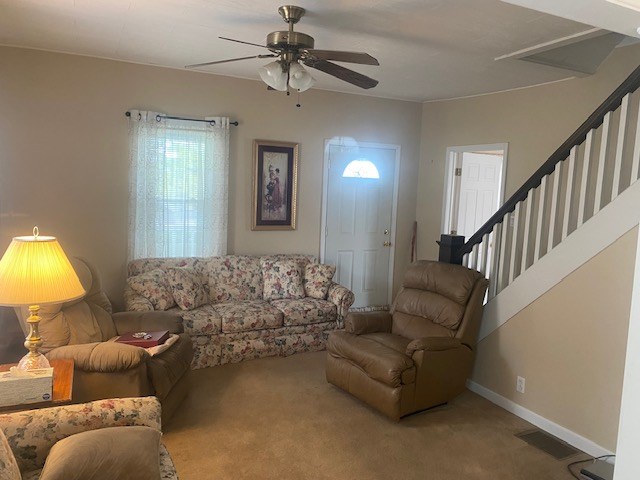 1007 Perryville Road Parker, PA 16049 - Photo 6 of 20 a living room with furniture and a lamp